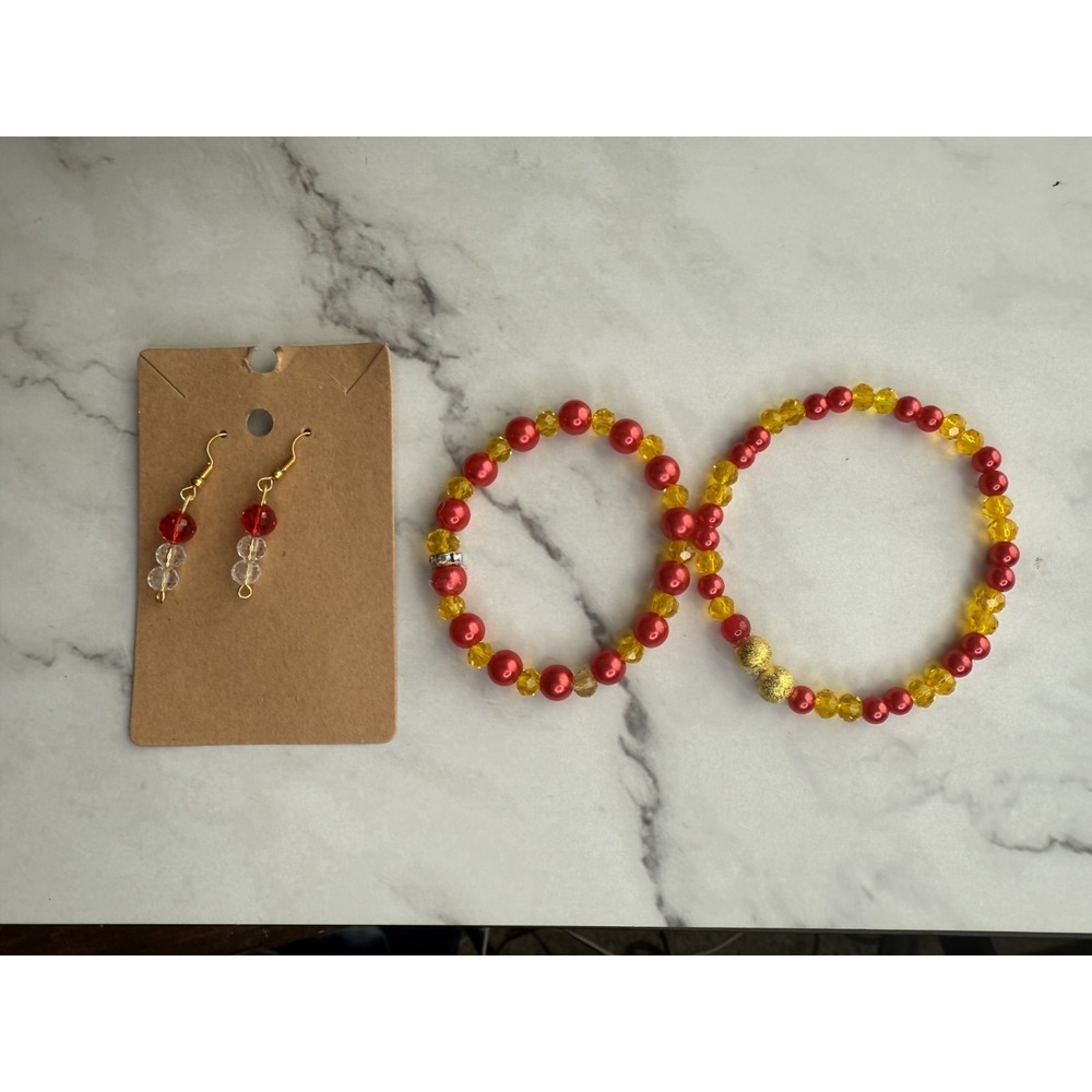 set of 2‎  pink, yellow  and gold beaded bracelets handmade